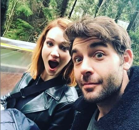 James Wolk with his wife Elizabeth Jae Lynch outdoors